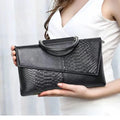 DOXXA GRACE l NOIR CLUTCH