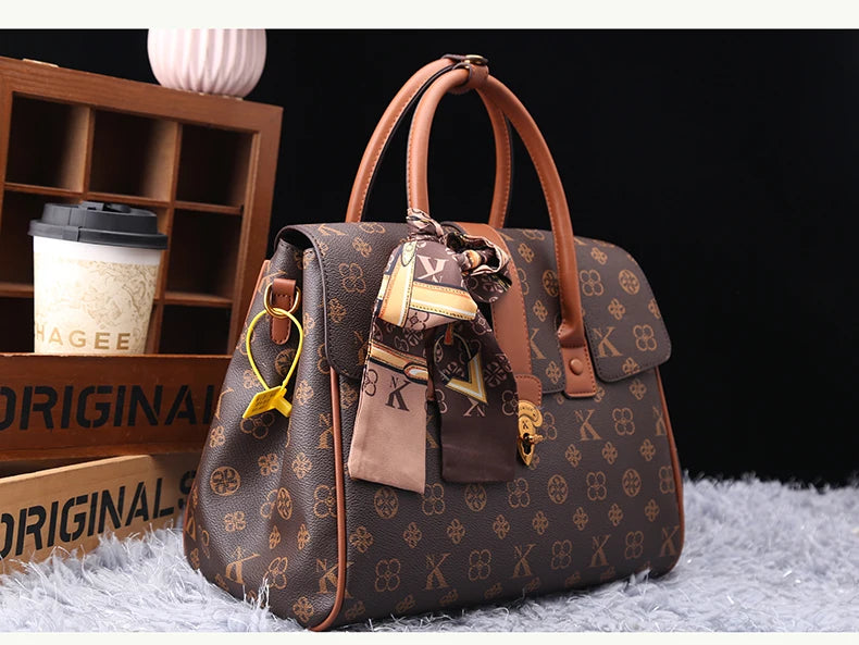 TÍTULO  Bolsa Satchel Monograma Victoria