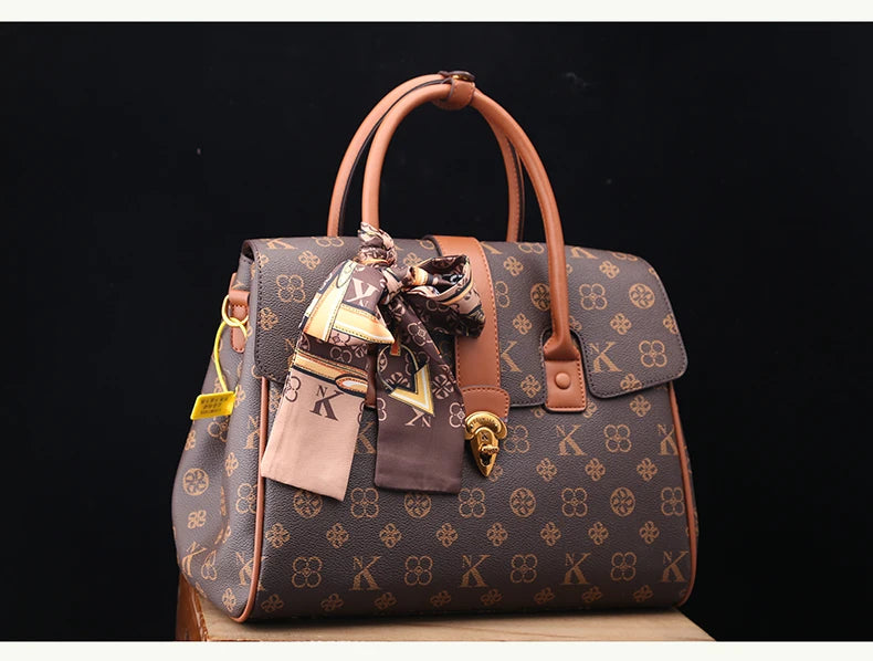 TÍTULO  Bolsa Satchel Monograma Victoria