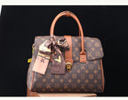 TÍTULO  Bolsa Satchel Monograma Victoria