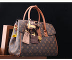 TÍTULO  Bolsa Satchel Monograma Victoria
